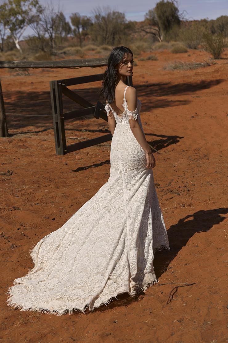 Model wearing an Evie Young dress