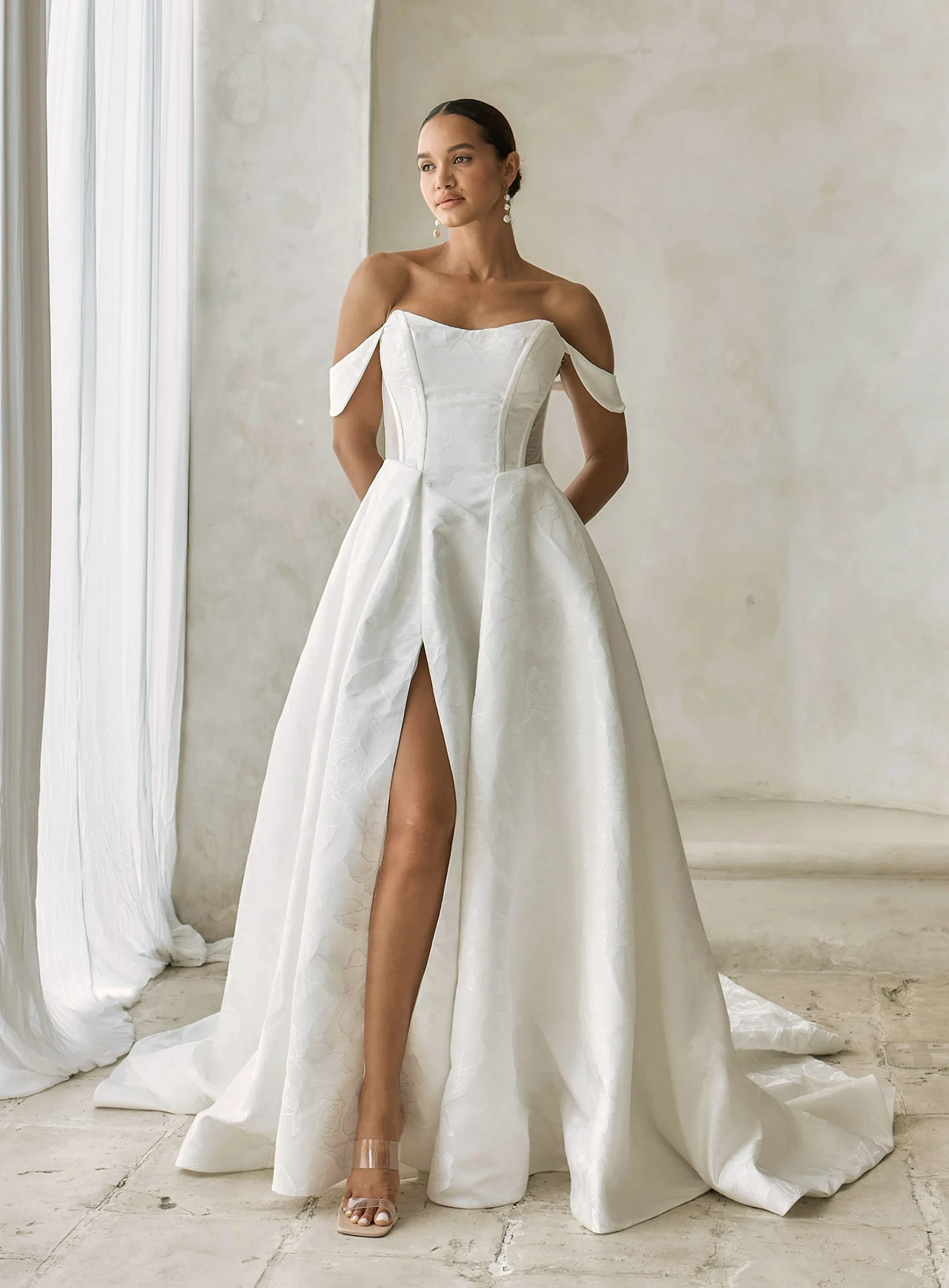 Model wearing a Serene Bridal dress