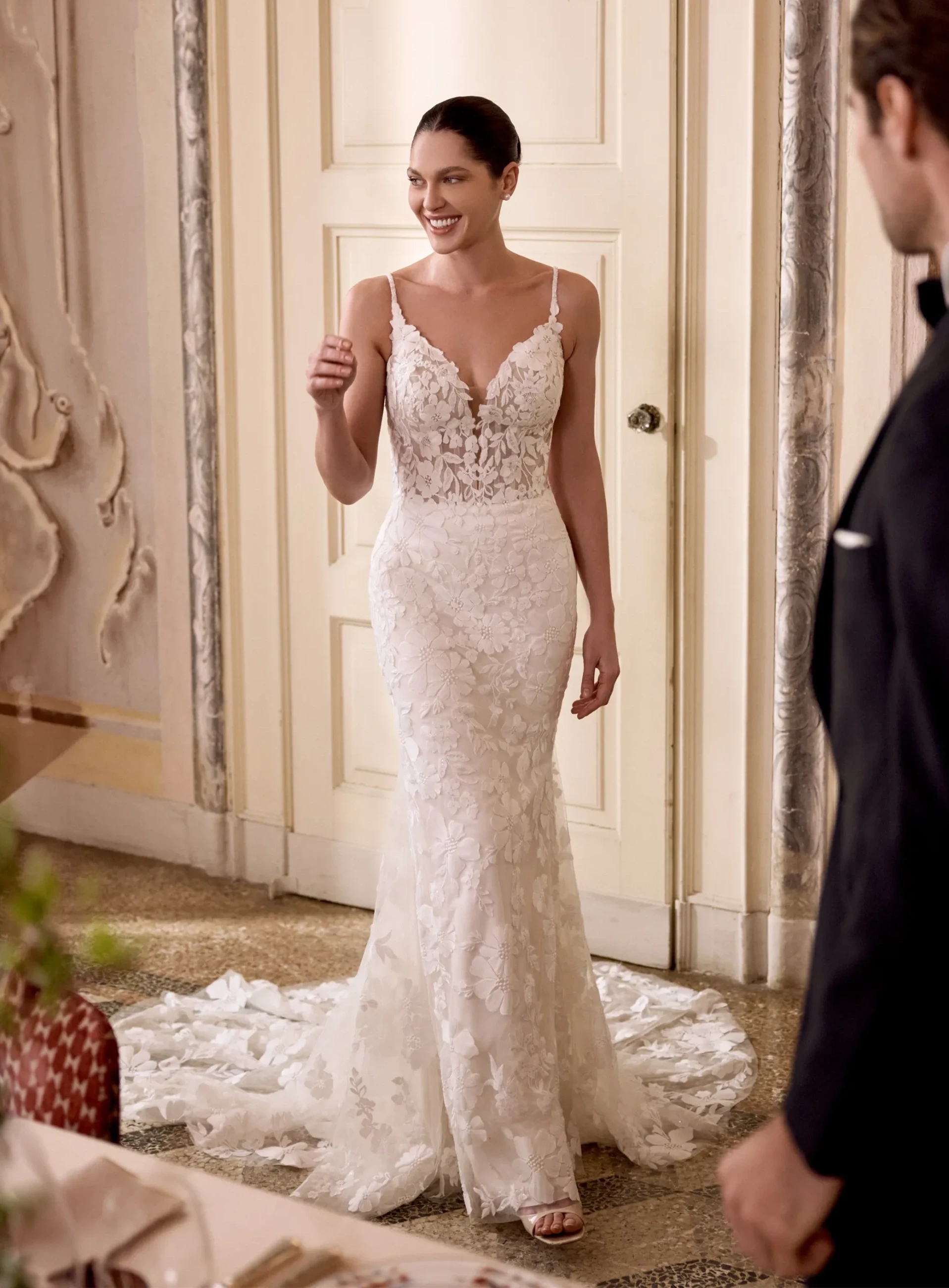 Model wearing a Justin Alexander dress